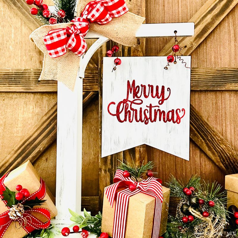 standing post sign with bow and merry christmas
