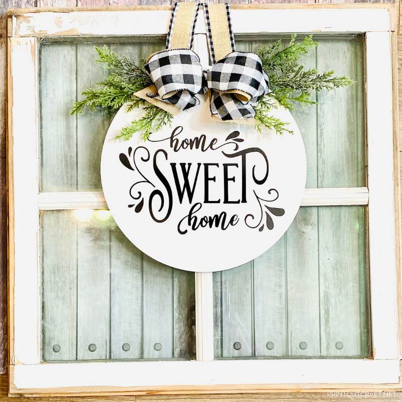 Home sweet home door hanger on a window