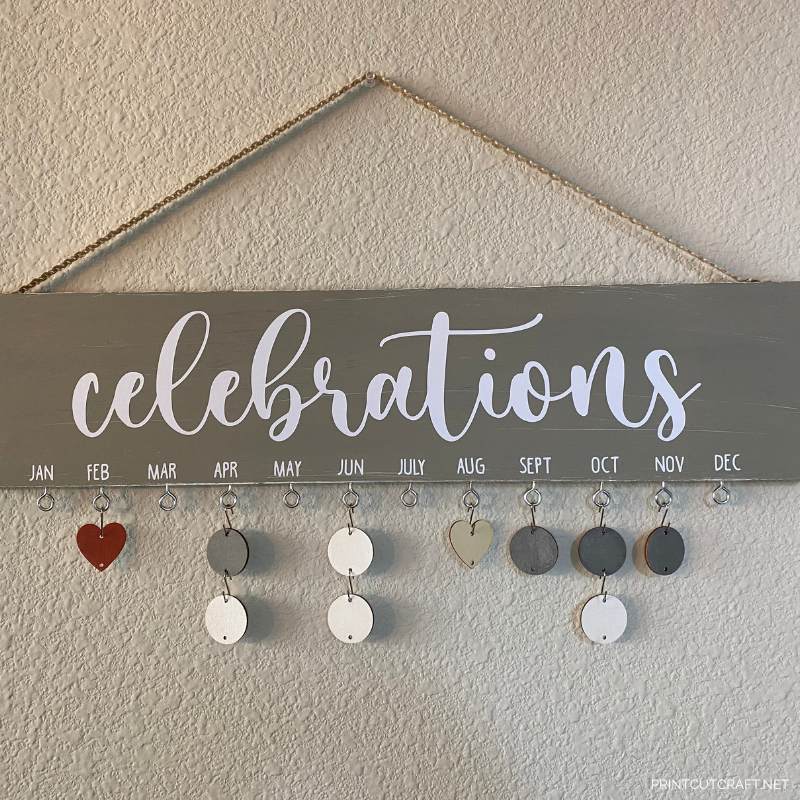 celebration wood sign with months